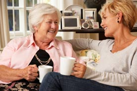 woman talking to elderly mother